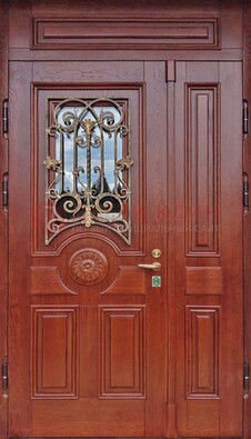 Филенчатая железная дверь со стеклом и ковкой ДСК-204 в Ступино