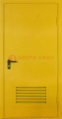 Желтая металлическая противопожарная дверь с вентиляционной решеткой ДТ-15 в Пскове